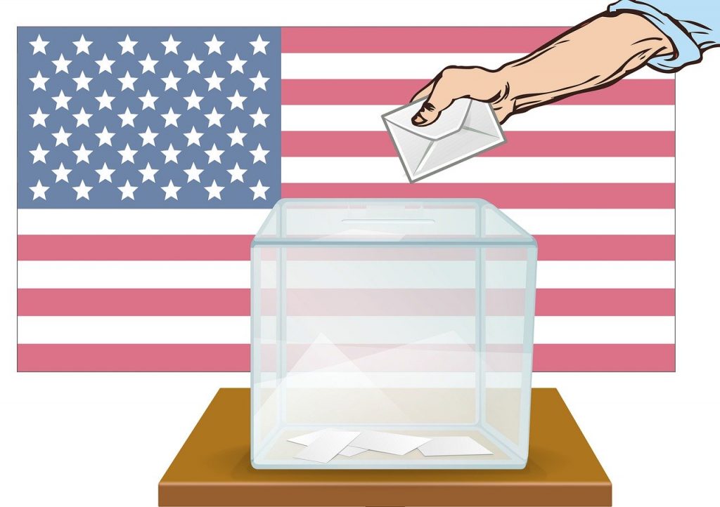 Drawing of hand depositing ballot into box in front of American flag