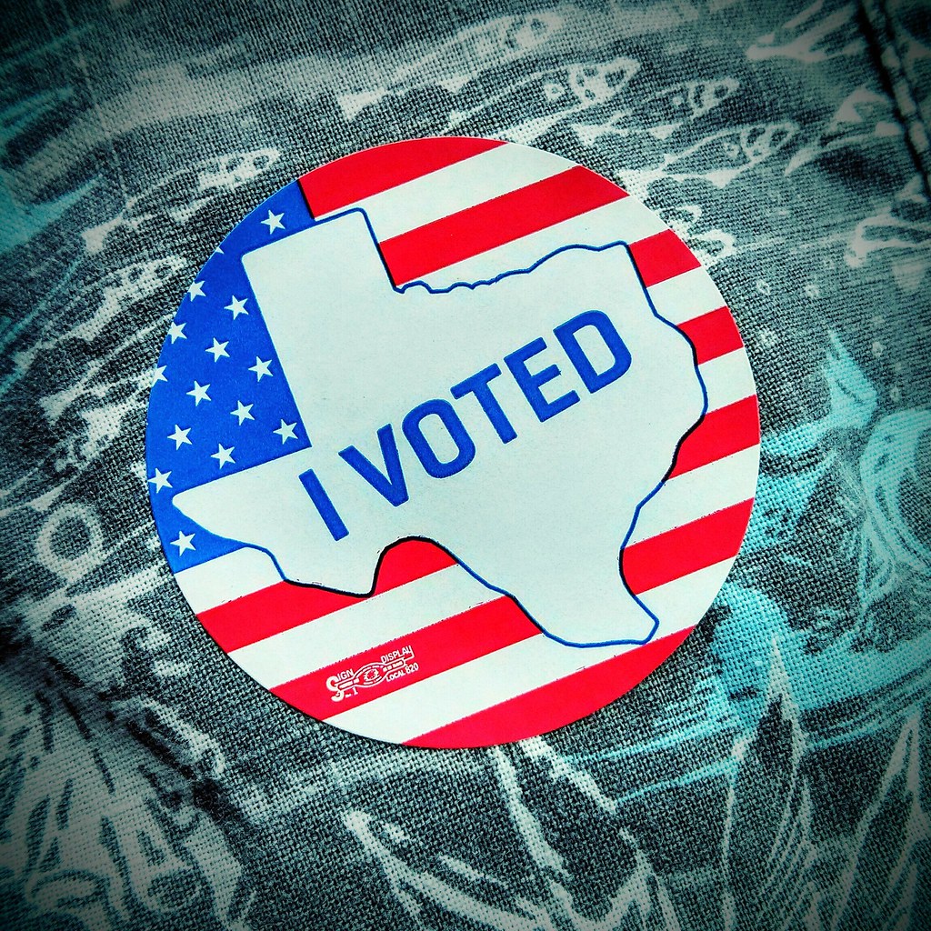 "I Voted" sticker with outline of Texas on American flag