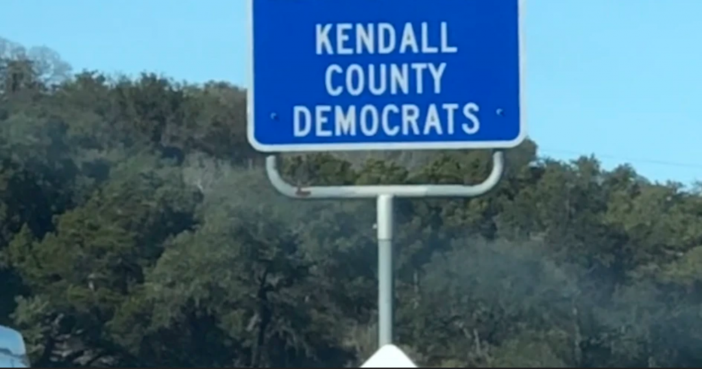 Kendall County Democrats adopt-a-highway sign
