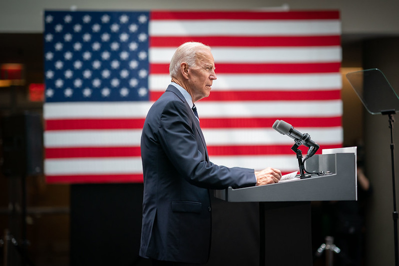 President Joe Biden standing at a podium