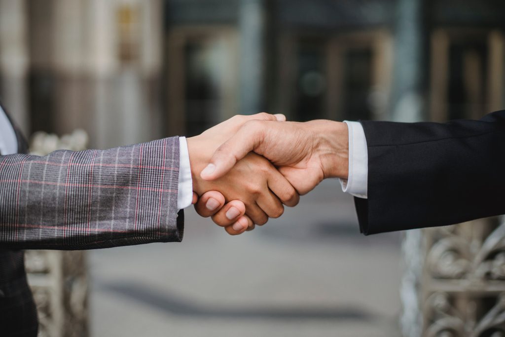 Handshake between two people