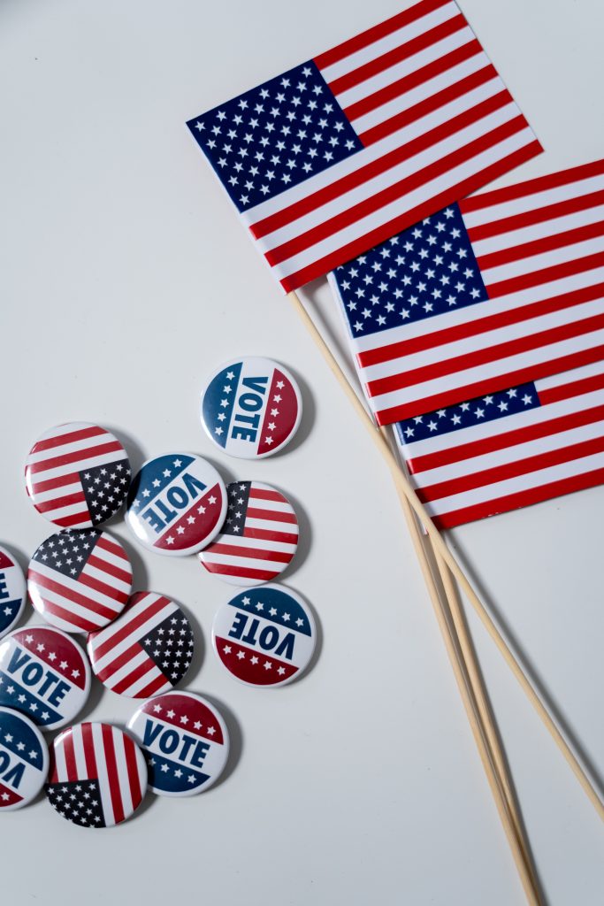 Vote buttons and American flags